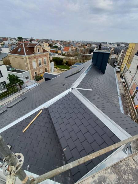 Artisan couvreur pour la réfection d'une couverture ardoise fibro ciment 40x24 à Yport proche Fécamp 76