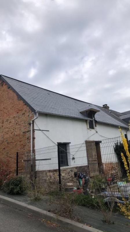 Réalisation d'une couverture en ardoise sur un bâtiment secteur Rolleville proche Le Havre